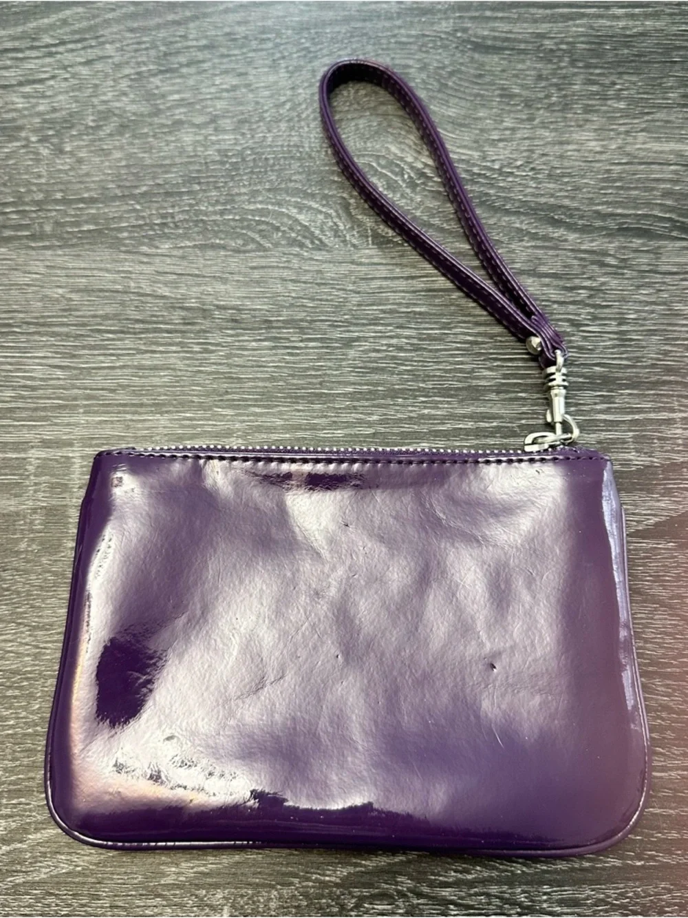 Women’s Express purple wristlet‎
